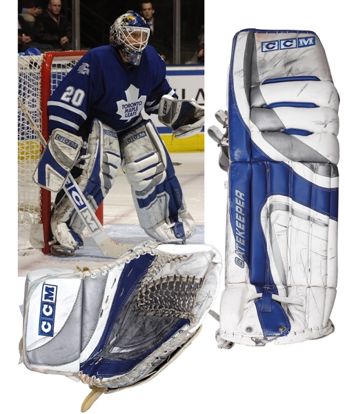 Ed Belfours 2005-06 Toronto Maple Leafs "448th Win" Game-Worn CCM Goalie Pad and Game-Used CCM Glove - Both Photo-Matched!