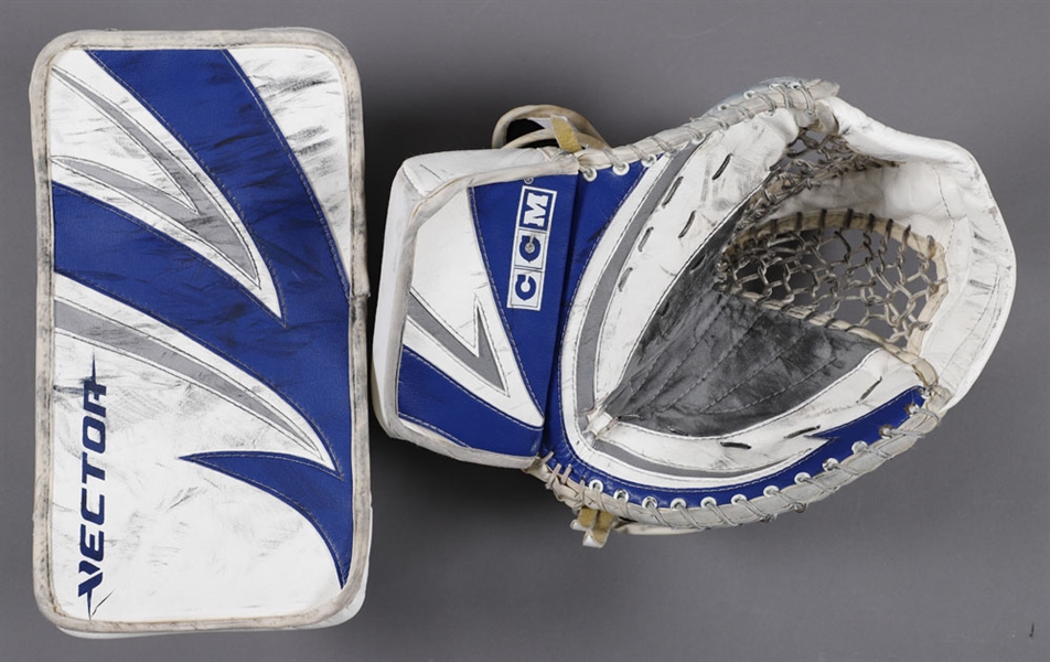 Ed Belfours 2005-06 Toronto Maple Leafs CCM Game-Used Glove and Blocker with His Signed LOA