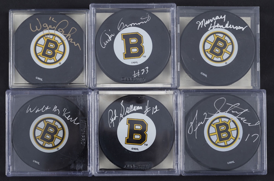 Boston Bruins Signed Puck Collection of 24 Including Pronovost, Horvath, Gardner, Stanfield, Dornhoeffer, Linseman, McKechnie, Cashman and Others