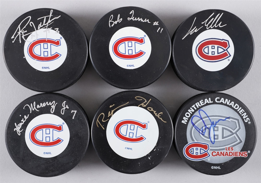 Montreal Canadiens Signed Puck Collection of 26 Including Turner, Jarvis, Litzenberger, Napier, McPhee, Picard, Houle and Others