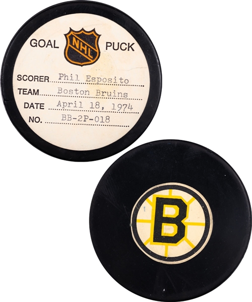 Phil Esposito’s Boston Bruins April 18th 1974 Playoff Goal Puck from the NHL Goal Puck Program - Season Playoff Goal #2 of 9 / Career Playoff Goal #39 of 61 - Assisted by Bobby Orr