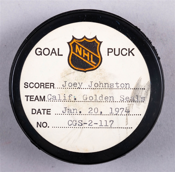 Joey Johnston’s California Golden Seals January 20th 1974 Goal Puck from the NHL Goal Puck Program - Season Goal #18 of 27 / Career Goal #62 of 85