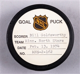 Bill Goldsworthy’s Minnesota North Stars February 13th 1974 Goal Puck from the NHL Goal Puck Program - Season Goal #30 of 48 / Career Goal #192 of 283 - Game-Tying Goal