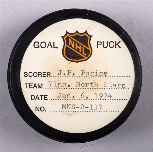 J.P. Parise’s Minnesota North Stars January 6th 1974 Goal Puck from the NHL Goal Puck Program - Season Goal #8 of 18 / Career Goal #124 of 238