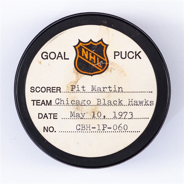 Pit Martins Chicago Black Hawks May 10th 1973 Playoff Goal Puck from the NHL Goal Puck Program - Season PO Goal #10 of 10 / Career PO #23 of 27 - 3rd Goal of Hat Trick - Power-Play Goal