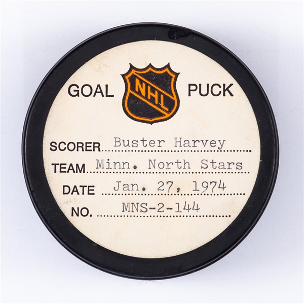 Buster Harveys Minnesota North Stars January 27th 1974 Goal Puck from the NHL Goal Puck Program - Season Goal #9 of 16 / Career Goal #42 of 90