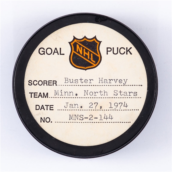 Buster Harveys Minnesota North Stars January 27th 1974 Goal Puck from the NHL Goal Puck Program - Season Goal #9 of 16 / Career Goal #42 of 90