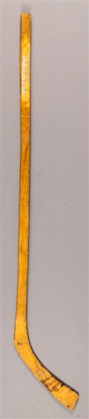 Vintage One-Piece Hockey Stick with Remnants of "Varsity" Paper Label
