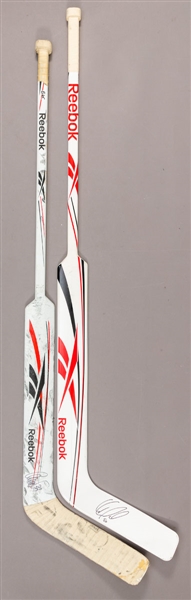 Cristobal Huets 2009-10 Chicago Black Hawks Signed Reebok 6K Game-Used Stick and Corey Crawfords Early-2010s Signed Reebok Game-Issued Stick with LOA