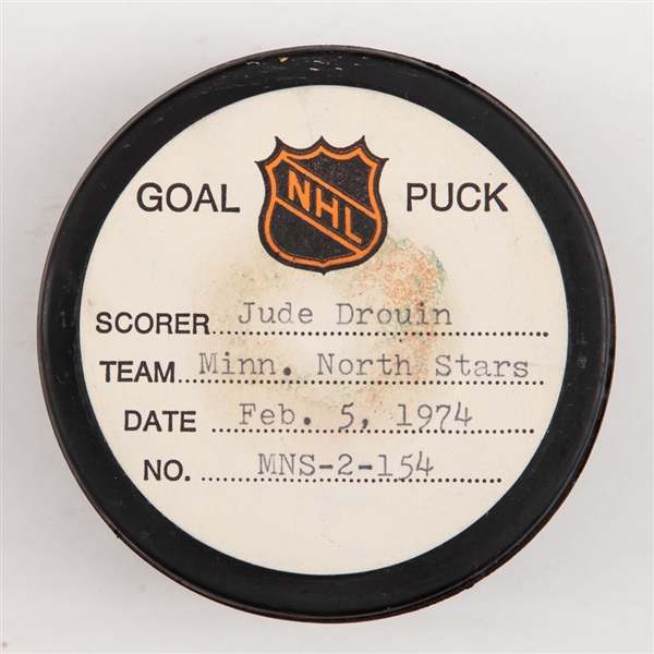Jude Drouins Minnesota North Stars February 5th 1974 Goal Puck from the NHL Goal Puck Program - Season Goal #13 of 19 / Career Goal #69 of 151