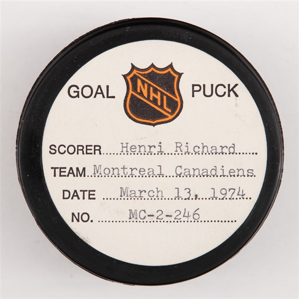 Henri Richards Montreal Canadiens March 13th 1974 Goal Puck from the NHL Goal Puck Program - Season Goal #14 of 19 / Career Goal #350 of 358 - Game-Tying Goal - Assisted by F. Mahovlich and Lafleur