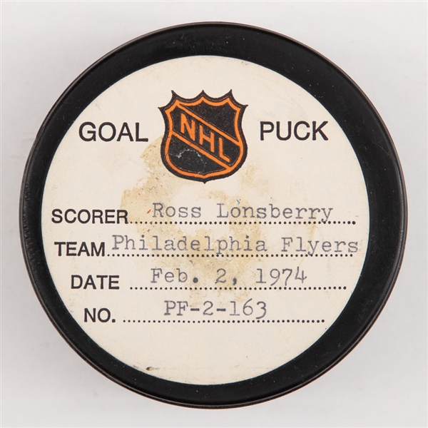 Ross Lonsberrys Philadelphia Flyers February 2nd 1974 Goal Puck from the NHL Goal Puck Program - Season Goal #18 of 32 / Career Goal #102 of 256 - 1st Goal of Hat Trick