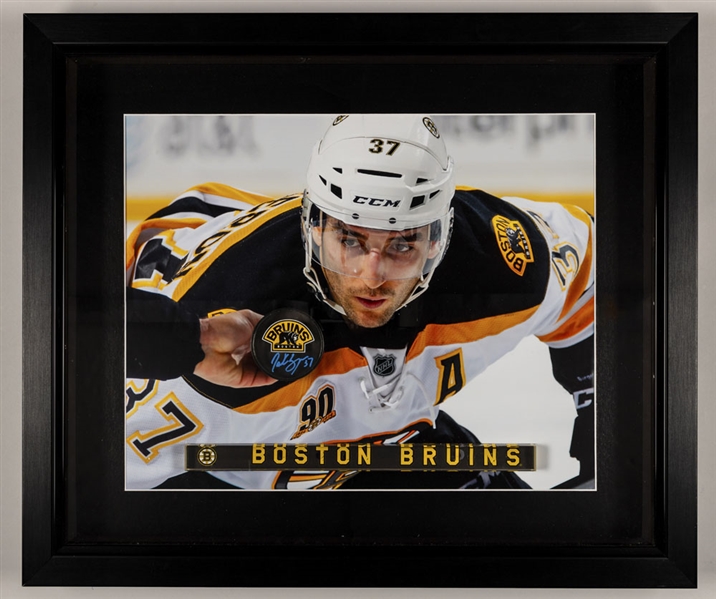 Patrice Bergeron Boston Bruins Acrylic Signed Puck Framed Display (23” x 28”) and Signed 16” x 20” Photo with COAs 