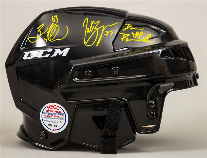 Boston Bruins Perfection Line Bergeron, Marchand and Pastrnak Triple-Signed CCM Helmet Plus Triple-Signed Photos (2) with COAs 