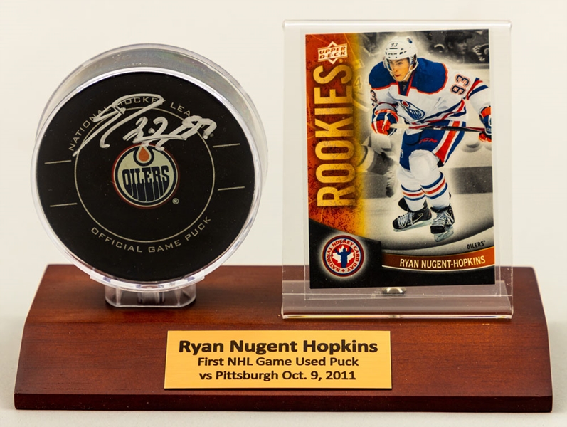 Ryan Nugent-Hopkins 2011-12 Edmonton Oilers Signed NHL Debut Game-Used Puck with Team LOA