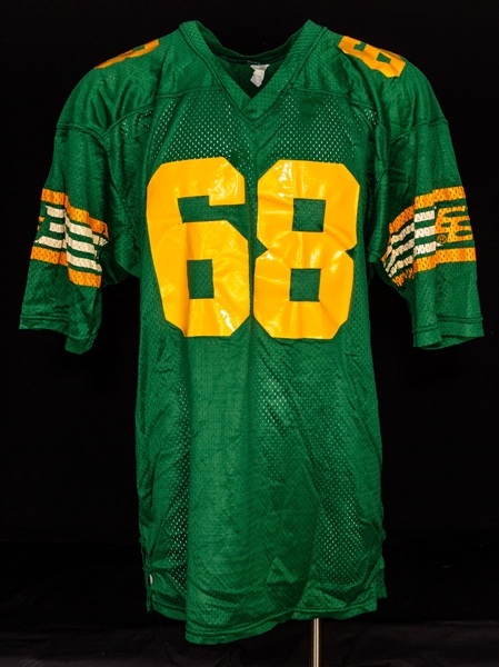 NFL and CFL Souvenir and Team Jersey Collection 13 Including Mid-1970s Green Bay Packers #51 Game-Worn Jersey Attributed to Jim Gueno and Mid-1980s CFL Edmonton Eskimos #68 Practice/Game-Worn Jersey
