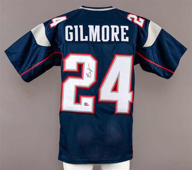 Stephon Gilmore Signed New England Patriots Jersey and Riddell Mini Helmet with COA