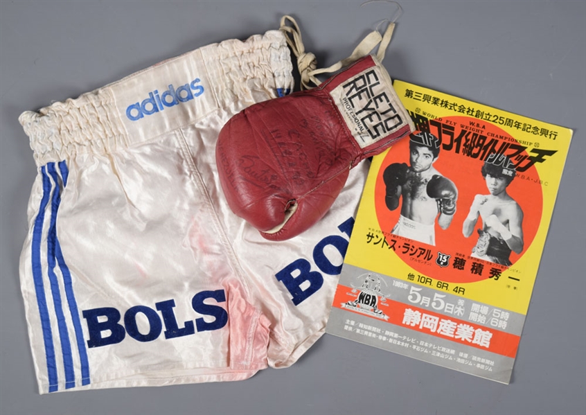 Santos Laciars Early-1980s Fight-Worn Trunks and Signed Fight Glove