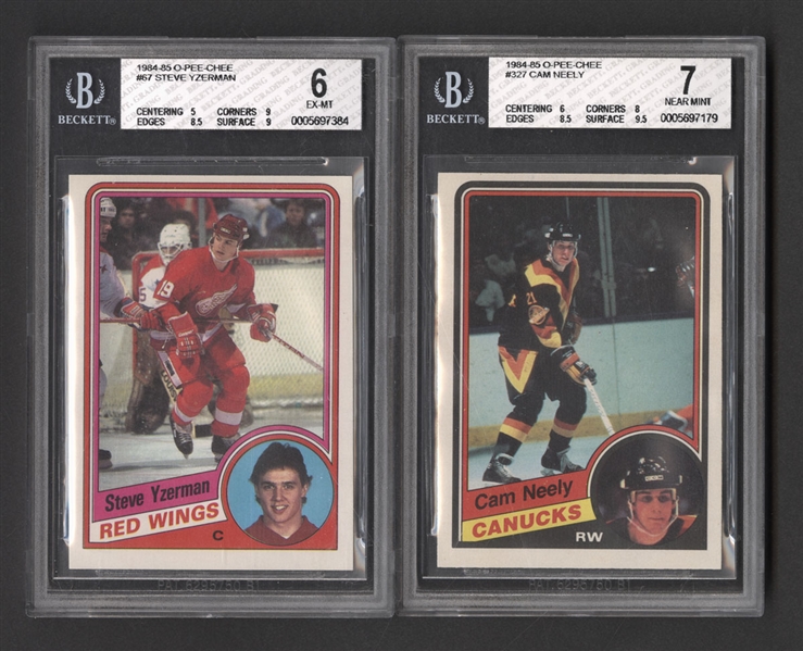 1984-85 OPC #67 Yzerman RC (Beckett 6), 1984-85 OPC #327 Neely RC (Beckett 7), 1990-91 UD #525 Fedorov RC (PSA 10), 1991-92 UD #335 Hasek RC (Beckett 9) and 2009-10 Goodwin Foil #81 Gretzky (SGC 9)