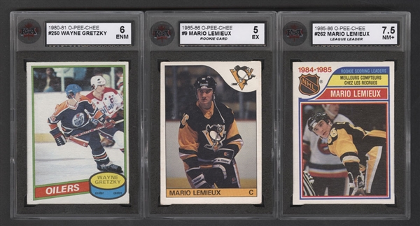 1985-86 O-Pee-Chee Hockey Card #9 HOFer Mario Lemieux Rookie (Graded KSA 5) and #262 (Graded KSA 7.5) Plus 1980-81 O-Pee-Chee #250 HOFer Wayne Gretzky (Graded KSA 6)