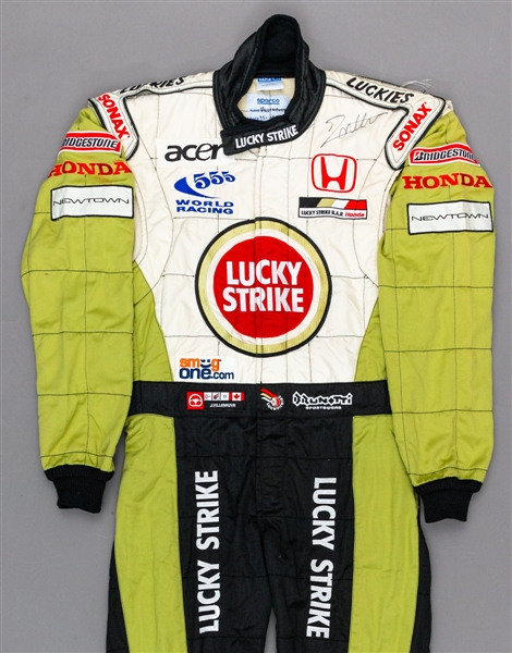 Jacques Villeneuves 2002 Lucky Strike BAR Honda F1 Team Signed Race-Worn Suit (Lucky Strike Sponsorship) with His Signed LOA