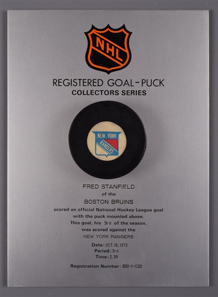 Fred Stanfields Boston Bruins October 18th 1972 Goal Puck on Plaque from the NHL Goal Puck Program - 3rd Goal of Season / Career Goal #128