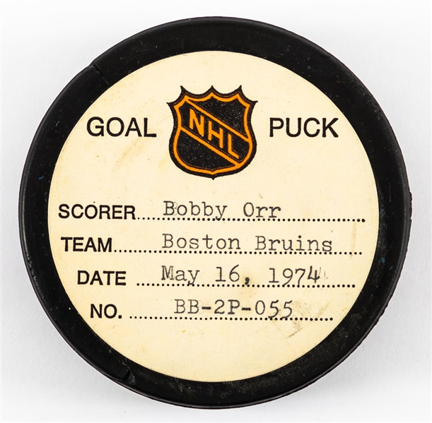 Bobby Orr’s Boston Bruins May 16th 1974 Stanley Cup Finals Goal Puck from the NHL Goal Puck Program - Season PO Goal #3 of 4 / Career PO Goal #24 of 26 – Game-Winning Goal – Three Point Night! 