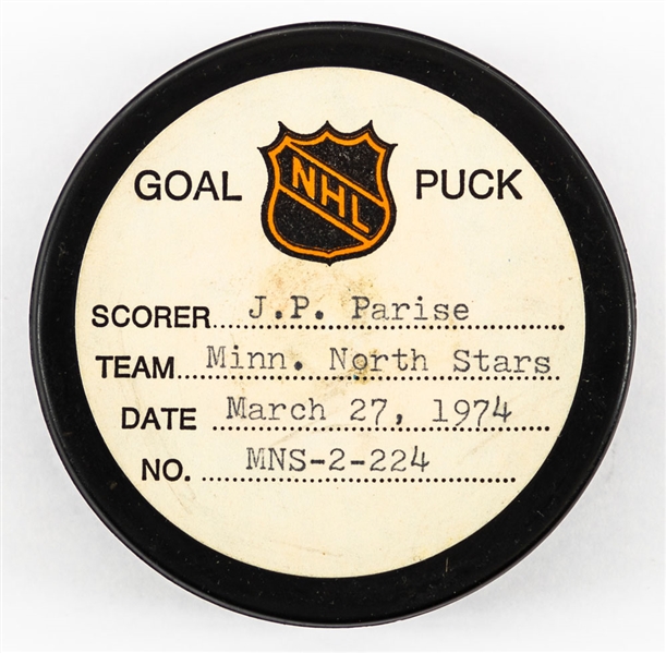 J.P. Parises Minnesota North Stars March 27th 1974 Goal Puck from the NHL Goal Puck Program - Season Goal #18 of 18 / Career Goal #132 of 238