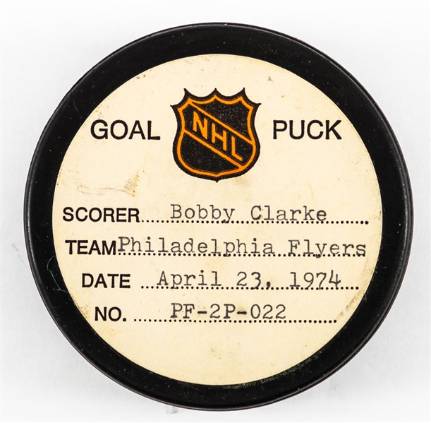 Bobby Clarkes Philadelphia Flyers April 23rd 1974 Playoff Goal Puck from the NHL Goal Puck Program – Season Playoff Goal #2 of 5 / Career Playoff Goal #4 of 42  