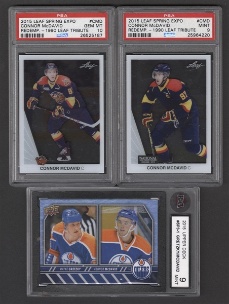 Connor McDavid Card Collection (8) Including 2015 Upper Deck #SP3-1 Gretzky/McDavid (Graded KSA 9) and 2015 Leaf National Convention Wrapper Redemption Acetate #CMD Connor McDavid (Graded PSA 10)