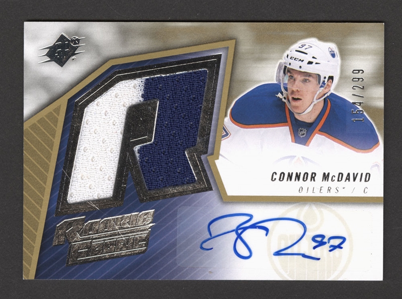 2015-16 Upper Deck SPx Retro Rookie Fabric Hockey Card #SPXR-CM Connor McDavid Autograph/Jersey (154/299) 