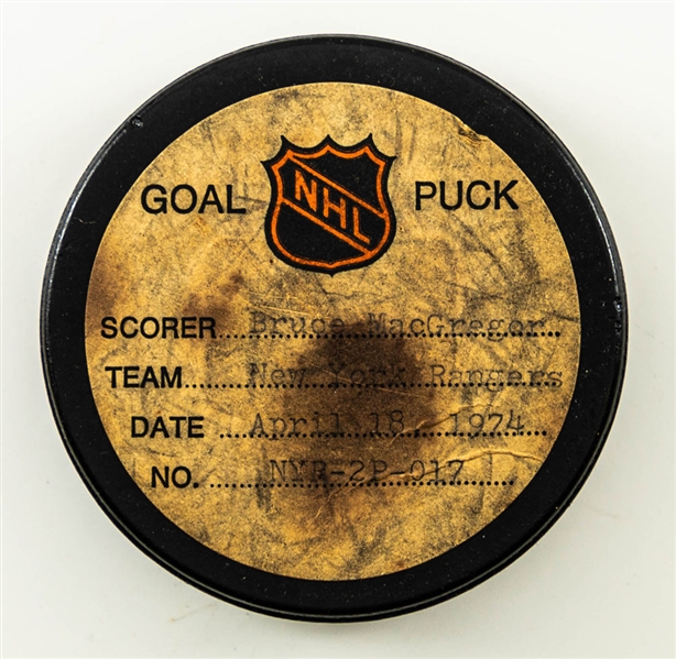 Bruce MacGregors New York Rangers April 18th 1974 Goal Puck from the NHL Goal Puck Program – Season Playoff Goal #6 of 6 – Career Playoffs Goal #19 of 19 (The Barry Meisel Collection) 