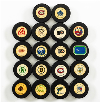 Early-1970s Biltrite NHL Puck Collection of 30 (Includes 12 NHL Reverse Pucks and 18 Blank Reverse Pucks)