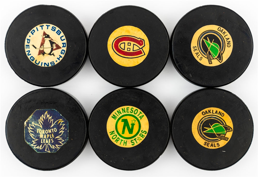 1967-68 Art Ross/Converse Minnesota North Stars NHL Game Puck and 1968-69 Art Ross/Converse NHL Game Pucks (5) Including Canadiens, Maple Leafs, Seals (2) and Penguins