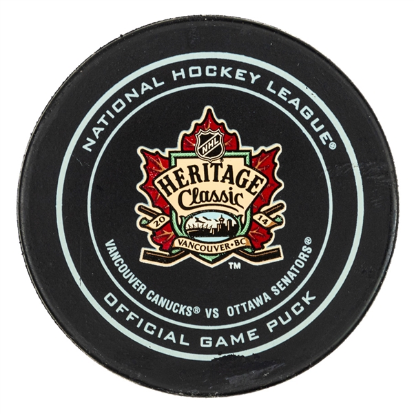 Zach Kassians 2014 NHL Heritage Classic Goal Puck - MeiGray Authenticated