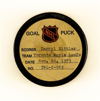 Darryl Sittler’s Toronto Maple Leafs November 20th 1973 Goal Puck from the NHL Goal Puck Program – 8th Goal of Season / Career Goal #62 of 484