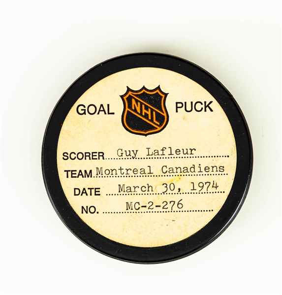 Guy Lafleur’s Montreal Canadiens March 30th 1974 Goal Puck from the NHL Goal Puck Program - 20th Goal of Season / Career Goal #77 of 560