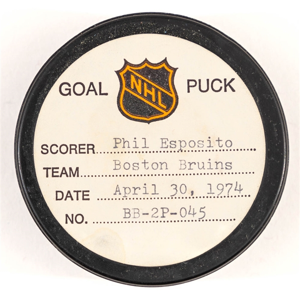 Phil Esposito’s Boston Bruins April 30th 1974 Playoff Goal Puck from the NHL Goal Puck Program - Season Playoff Goal #7 of 9 / Career PO Goal #44 of 61 - Assisted by Bobby Orr