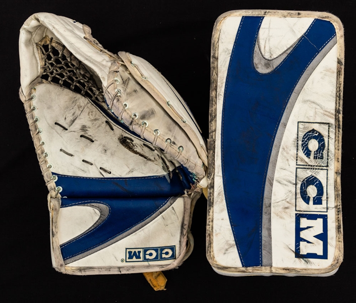Ed Belfour’s 2002-03 Toronto Maple Leafs Game-Used CCM Heaton Glove and Blocker Plus Signed CCM Heaton Game-Issued Stick with His Signed LOA