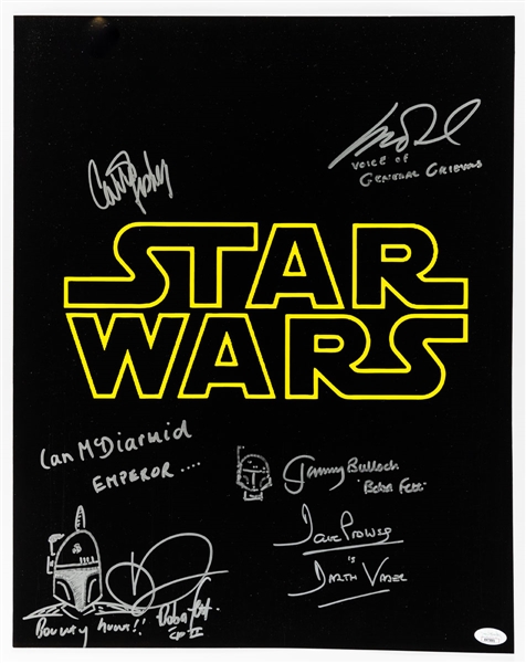 Star Wars Cast Multi-Signed Photo by 6 Including Carrie Fisher, Matthew Wood, Ian McDiarmid, Jeremy Bulloch, David Prowse and Daniel Logan with JSA LOA (16” x 20”)