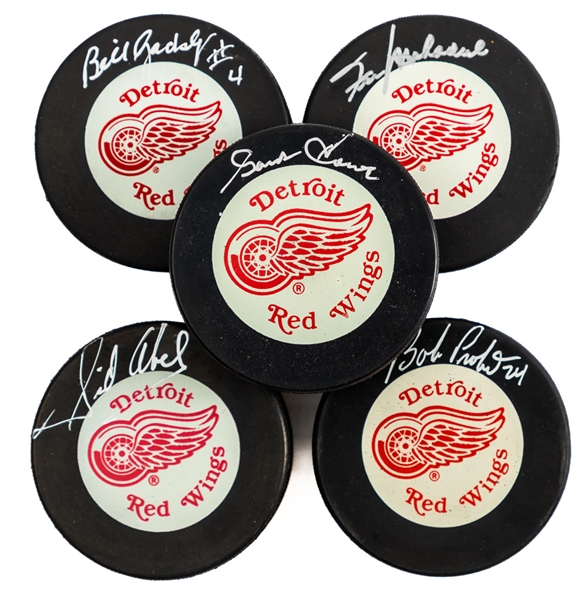 Detroit Red Wings Signed Puck Collection of 5 Including Howe, Abel, F. Mahovlich, Gadsby and Probert with LOA