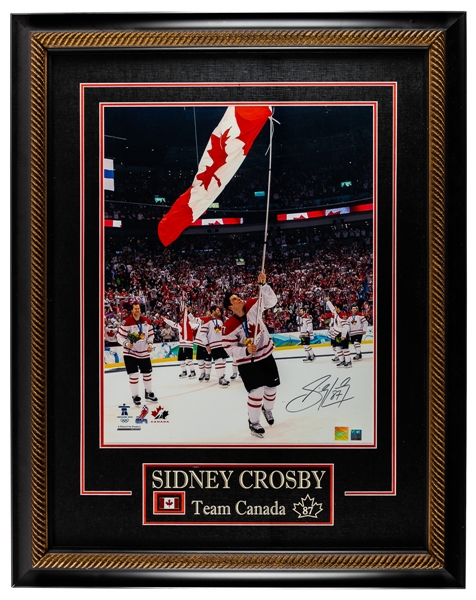 Sidney Crosby Team Canada 2010 Vancouver Olympics "Waving the Flag" Signed Framed Photo with Frameworth COA (27” x 34”)