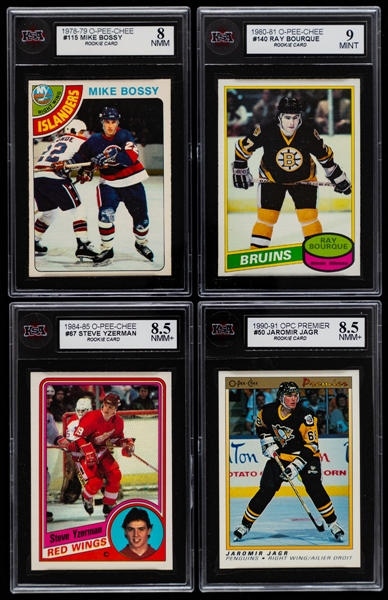 1980-91 O-Pee-Chee Hockey Rookie Cards (4) Including 78-79 #115 Mike Bossy (KSA 8), 80-81 #140 Ray Bourque (KSA 9), 84-85 #67 Steve Yzerman (KSA 8.5) and 90-91 #50 Jaromir Jagr (KSA 8.5)