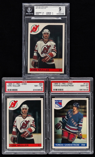 1985-86 O-Pee-Chee PSA/BVG-Graded Hockey Cards (7 - Most are RC) Including #84 Kirk Muller Rookie (BVG 9 & PSA 8), #123 Tomas Sandstrom Rookie (PSA 10) and #210 Al Iafrate Rookie (PSA 9)