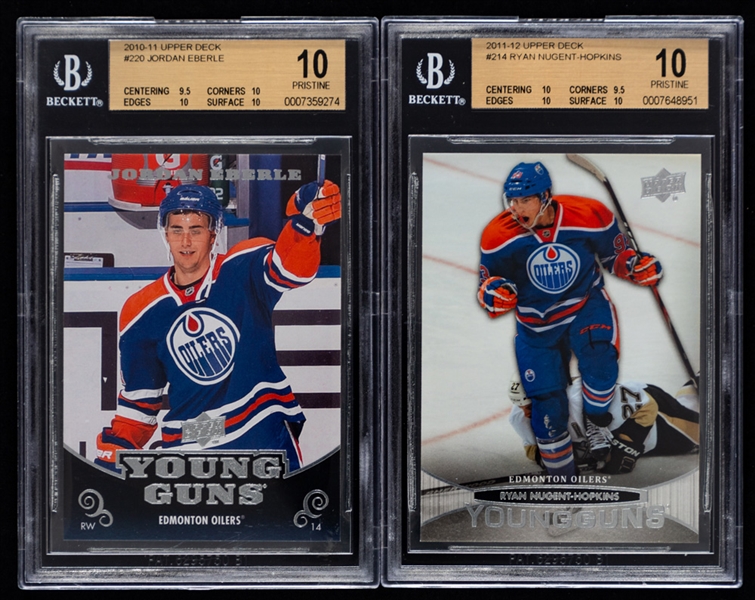 2010-11 Upper Deck Young Guns Hockey Card #220 Jordan Eberle Rookie (Graded Beckett Pristine 10) and 2011-12 Upper Deck Young Guns #214 Ryan Nugent-Hopkins Rookie (Graded Beckett Pristine 10) 