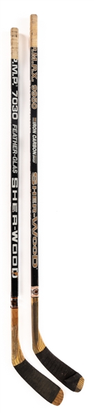 Ray Bourque Game-Used Stick Collection of 2 Including Late-1980s Boston Bruins Sher-Wood PMP 7030 Plus Mid-1990s Boston Bruins Sher-Wood PMPX 9950 