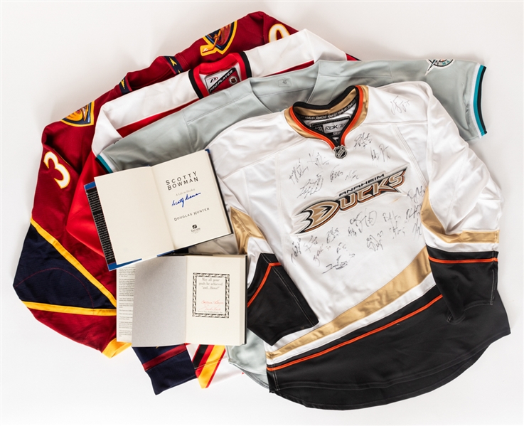 NHL and MLB Jersey Collection of 4 including Tim Raines 2002 Florida Marlins GI, Jan Hurmes 2003-04 Atlanta Thrashers GI, 2006-07 Anaheim Ducks and 1999-00 Calgary Flames Team-Signed Plus More