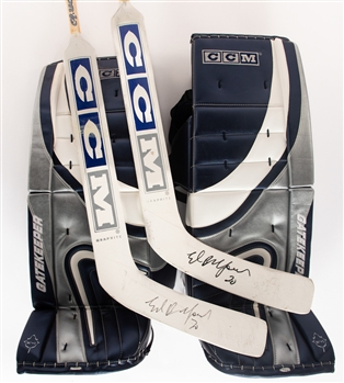 Ed Belfours Mid-2000s Pro Stock CCM Gatekeeper Goalie Pads and Early-to-Mid-2000s Toronto Maple Leafs CCM Game-Issued Signed Sticks (2) From His Personal Collection with His Signed LOA