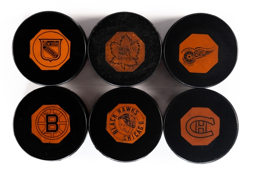 1958-67 “Original Six” Art Ross NHL Game Puck Complete Set of 6 