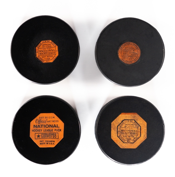 Art Ross NHL Game Puck Collection of 4 including Rare Andover Puck, 1942-50 Puck and 1964-67 Chicago Black Hawks Original Six Puck 